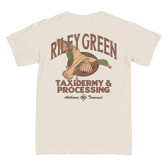 Cream tee with riley green taxidermy & processing text on back and mallard image