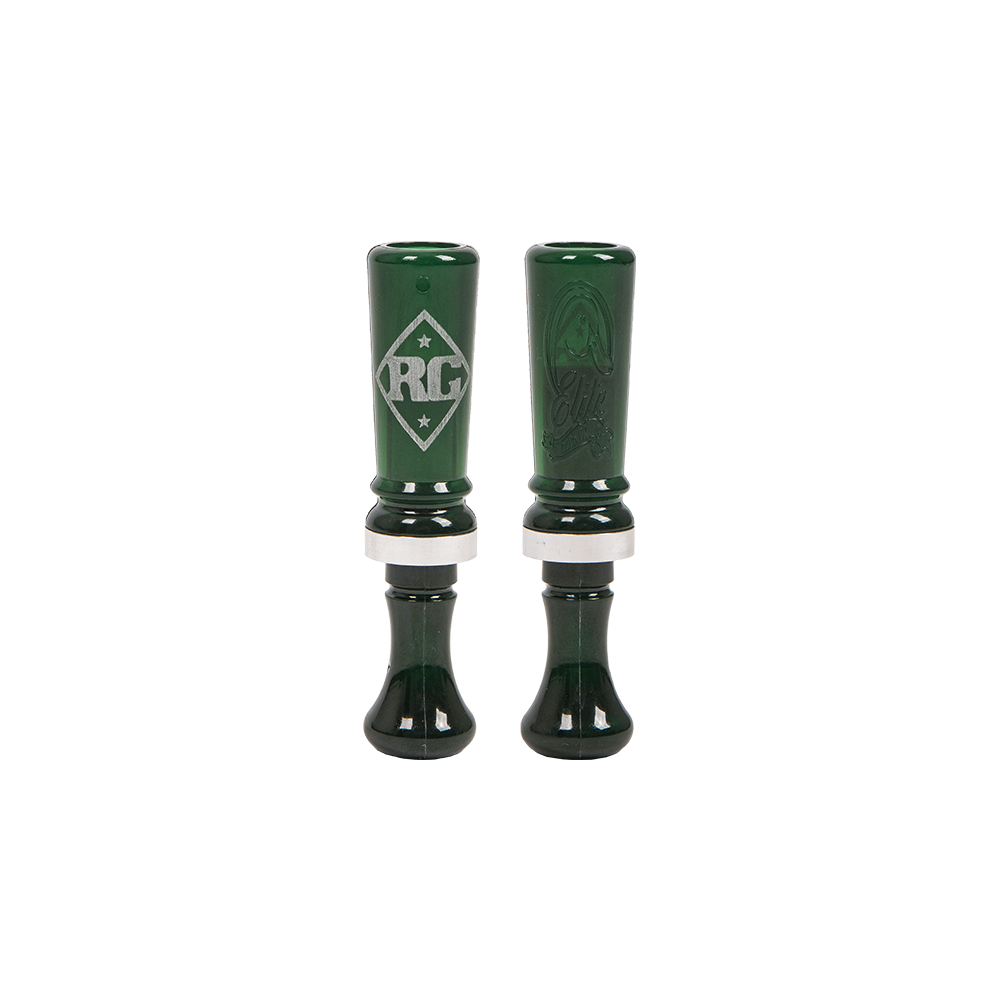Two green single reed duck calls with double-sided engraving and the RG logo visible. Riley Green