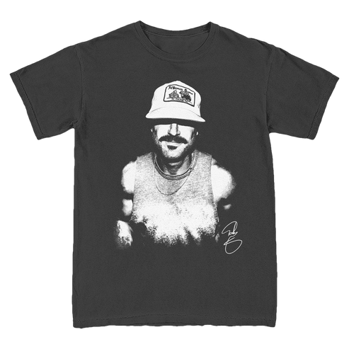 A black crew neck t-shirt with a white graphic print of a person wearing a hat on the front.