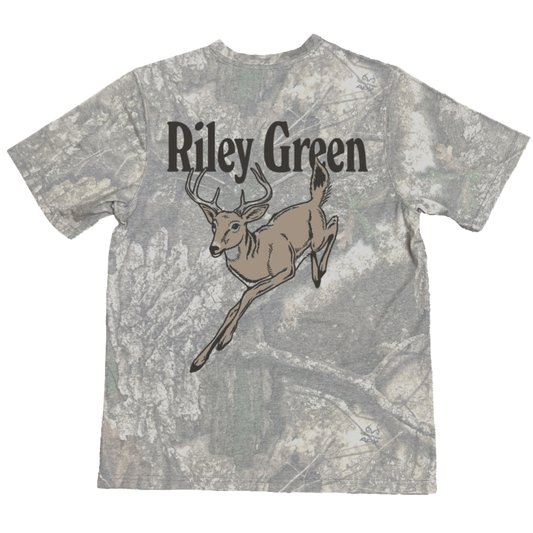 Camo-patterned t-shirt with a deer graphic and 'Riley Green' text on a white background