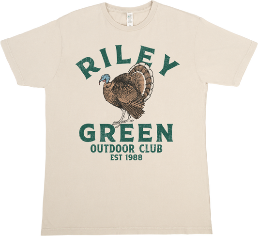 Beige t-shirt with a turkey graphic and text 'Riley Green Outdoor Club Est 1988' on a white background